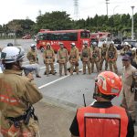 firefighters taking part in a city training exercise