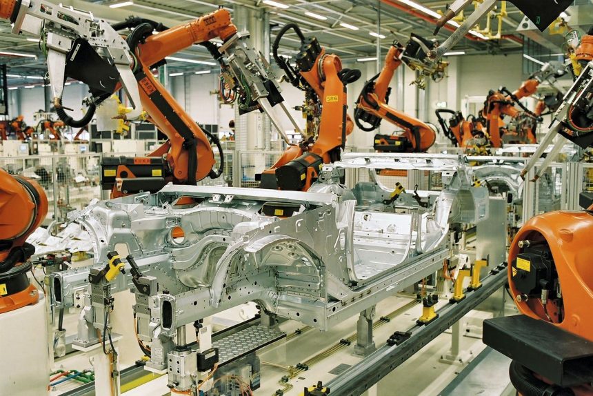 Workers on a modern factory production line